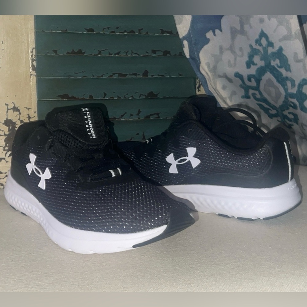 Under Armour charged impulse Black and White Sneakers
Athletic running shoesNWOT